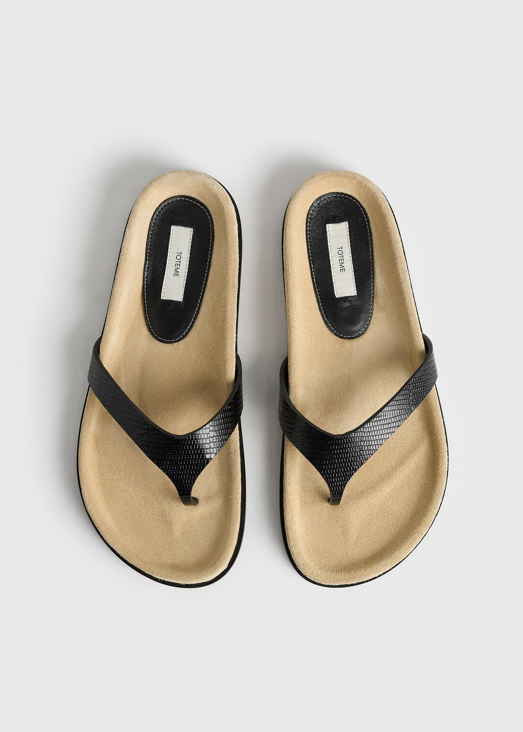 Contoured lizard-embossed flip flops beige/black